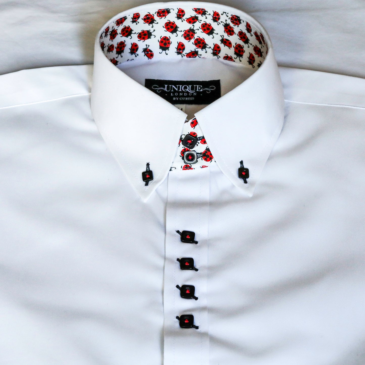 UNIQUE WHITE SHIRT WITH FLORAL TRIM
